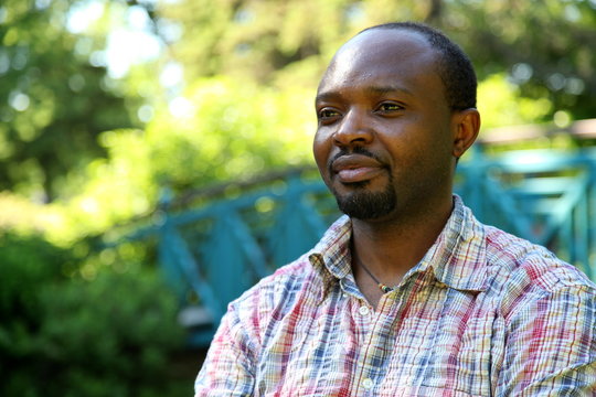 Young man from Africa, thinking