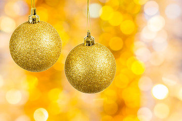 Christmas balls on festive abstract background