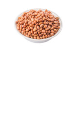 Peanut or ground nut in white bowl over white background