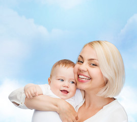 happy mother with smiling baby