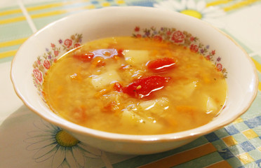 Bowl with a fresh soup isolated on the white background