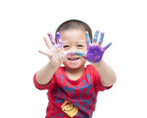 A  happy little boy with paints on hands on white background