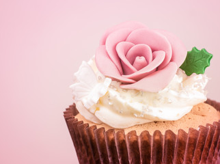 Sweet cupcake processed in pink tone