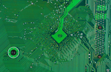 Close up of a printed green computer circuit board