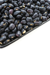 Black beans isolated on white background
