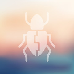 beetle icon on blurred background