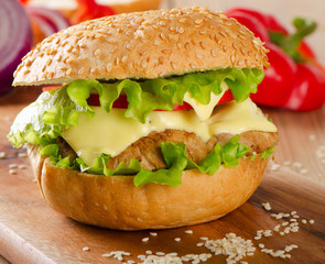 Homemade hamburger with fresh vegetables.
