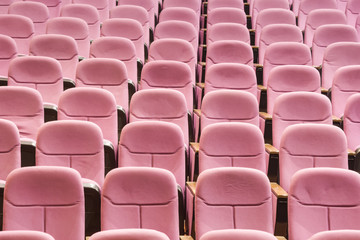 Empty movie theater with red seats