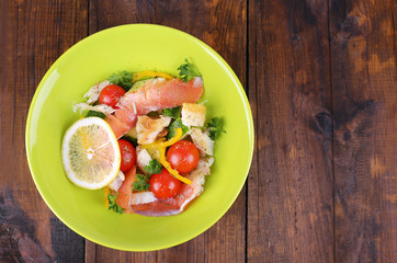 Fresh fish salad with vegetables