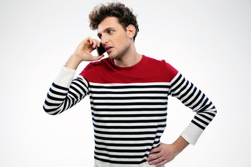 Handsome casual man talking on the phone