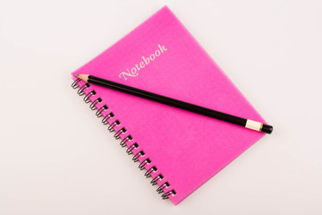 Notebook and pencil