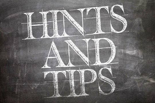 Hints And Tips Written On Blackboard