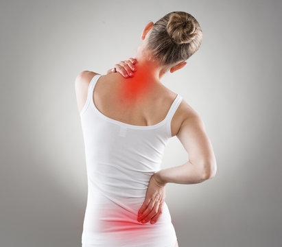 Spine osteoporosis. Spinal cord problems on woman's back