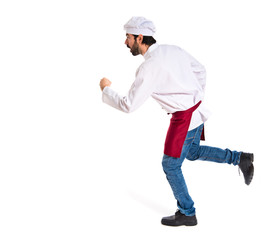 Chef running fast over white background
