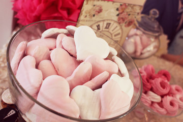 Sweets on table, with clock and vintage design