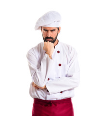 Chef thinking over white background