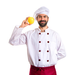 Chef holding an apple