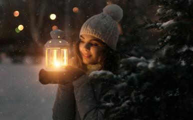 Cute girl with a lantern