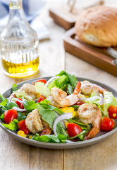 Prawns with sweet corn and rocket salad