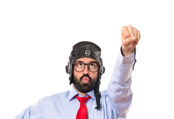 Businessman with pilot hat over white background