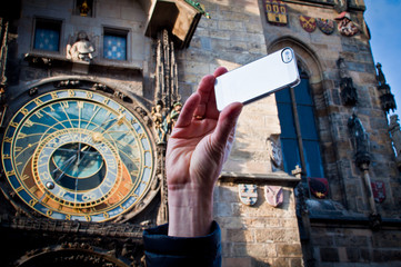 Taking picture with mobile at Prague clock