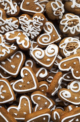 Christmas homemade gingerbread cookies over wooden table