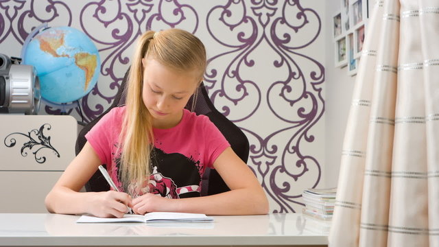 Young girl doing her homework