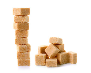 Cubes of cane sugar isolated on white background