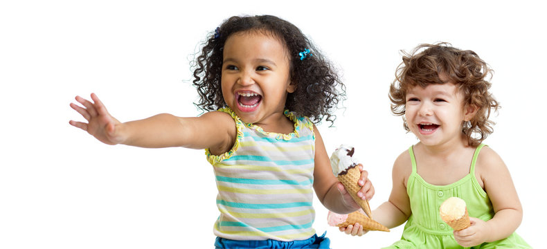 Two Happy Kids Eating Ice Cream On White