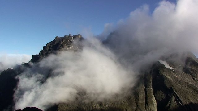 Rwenzori mountain view with passing clouds
