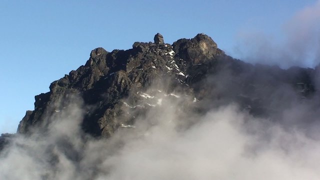 Rwenzori mountain view with passing clouds