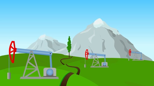 working oil rocking on the field with mountains in background