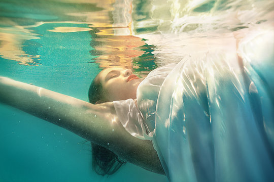underwater girl in swimming pool