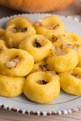 Polish noodles ( kluski slaskie ) with potatoe and pumpkin