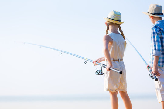 Boy And Girl With Fishing Rods