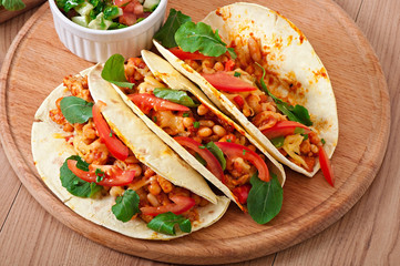Tacos with chicken and bell peppers