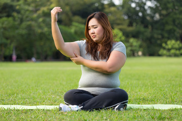 obese women is worrying about her overweight