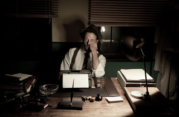 1950s journalist working late at night