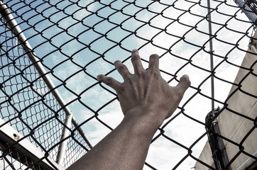need freedom with hand in jail