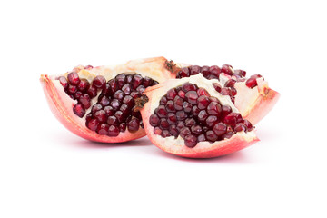 Ripe pomegranate fruit isolated on white background cutout
