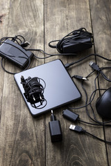 Battery charger and wires tech mess © librakv