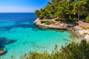 Fototapeta na wymiar Beach with turquoise sea water, Cala Mitjaneta, Menorca island