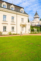 Beautiful palace in green park of Radziejowice village, Poland