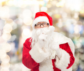 man in costume of santa claus with bag