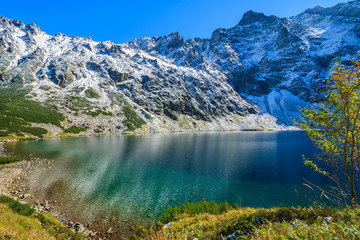 Czarny Staw lake in autumn colours, High Tatra Mountains, Poland © pkazmierczak
