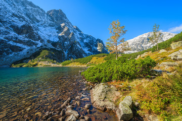 Naklejka na ściany i meble Czarny Staw lake in autumn colours, High Tatra Mountains, Poland