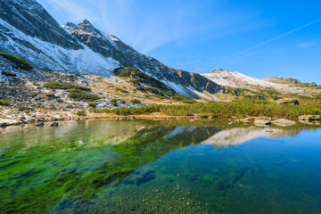Fototapeta na wymiar Lake in Gasienicowa valley in autumn, Tatra Mountains, Poland