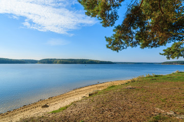 Shore of Chancza lake in autumn season, Poland
