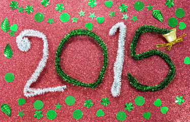new year figures - red base and green flakes/bell