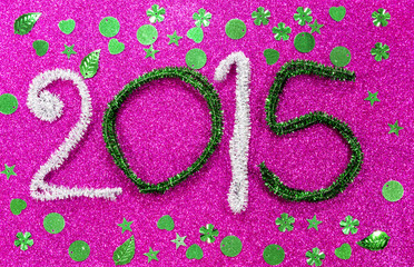 new year figures on fuchsia base